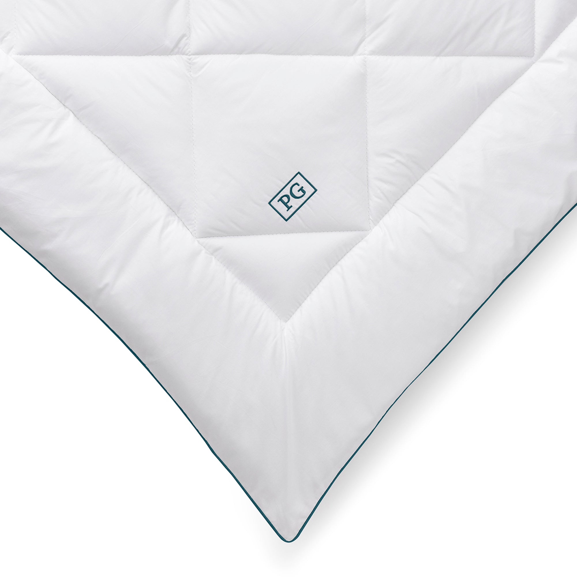 Close-up of the Pillow Guy Signature Down Alternative Mattress Pad showing diamond box quilting and soft cotton sateen fabric