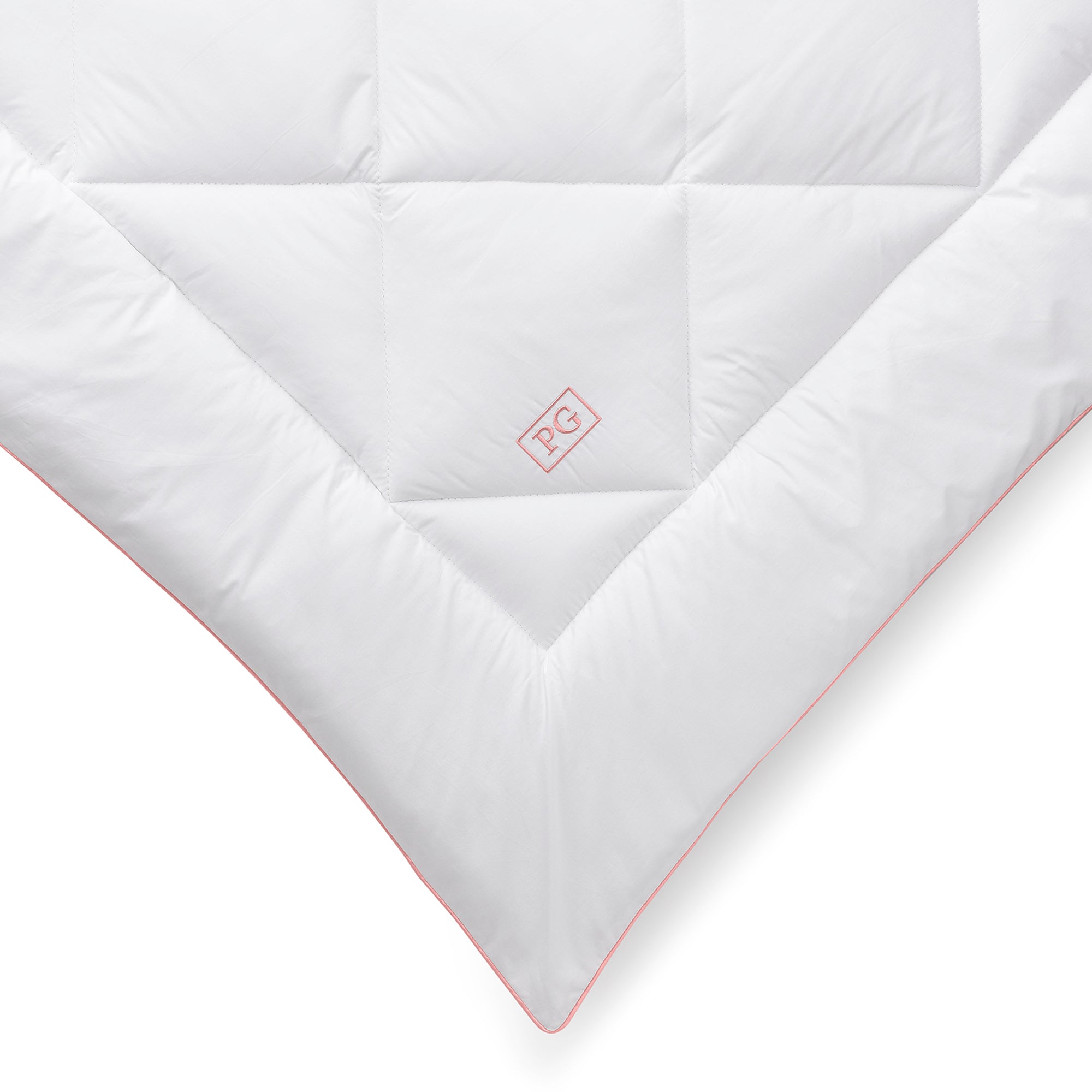 Close-up of the Pillow Gal Signature Down Alternative Mattress Pad showing diamond quilted construction and soft cotton sateen fabric